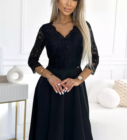 309-11 AMBER nėriniuota, elegantiška ilga suknelė su iškirpte ir kojos skeltuku – juoda