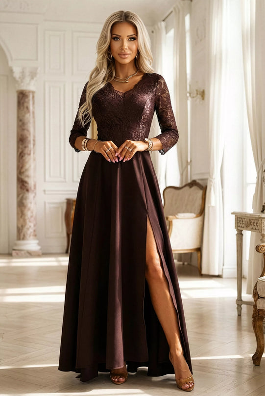 309-14 AMBER Elegantiška ilga nėriniuota suknelė su skeltuku – šokoladinė