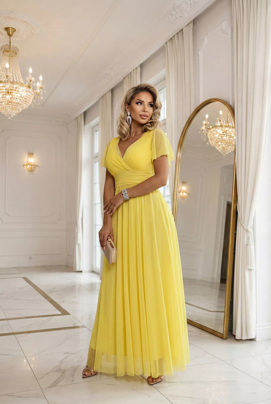 562-8 NASTIA ilga suknelė su iškirpte, raišteliu ir trumpomis rankovėmis – citrininė Limoncello
