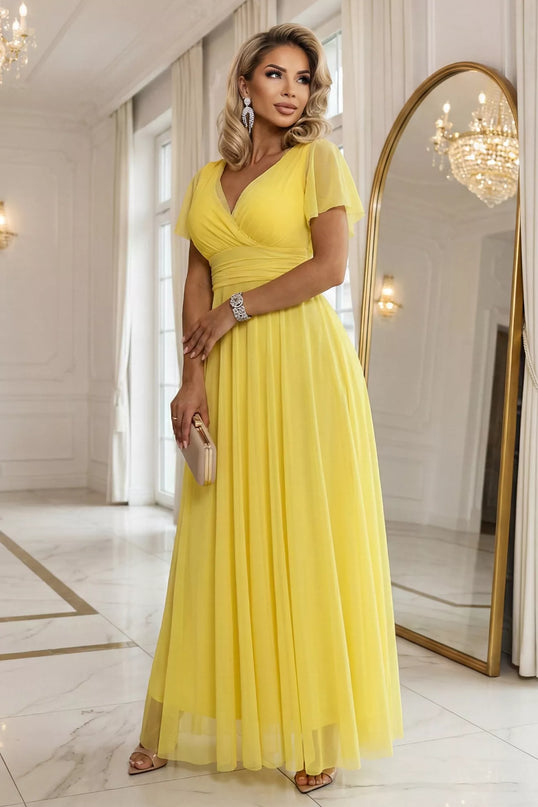 562-8 NASTIA ilga suknelė su iškirpte, raišteliu ir trumpomis rankovėmis – citrininė Limoncello