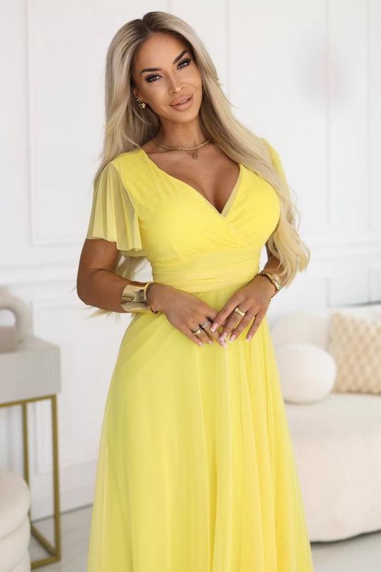562-8 NASTIA ilga suknelė su iškirpte, raišteliu ir trumpomis rankovėmis – citrininė Limoncello